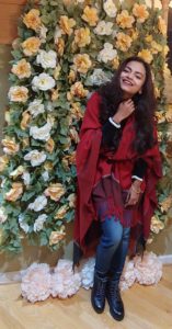 Bidisha Sinha red shawl smile